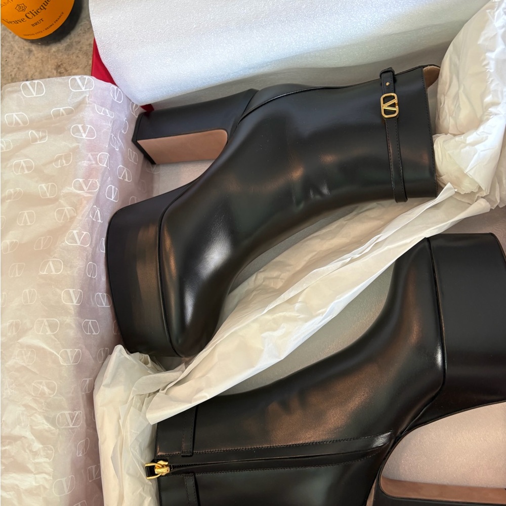 Valentino Black Heeled Boots with Gold Accents
Shipping US only 
+ $25 shipping